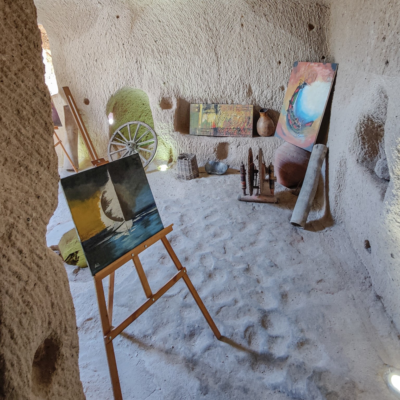 a cave in cappadocia used as shooting location for bartin. It is full of art work